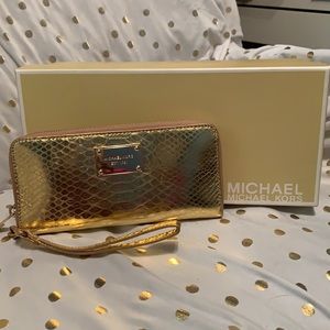 Michael Kors gorgeous gold wallet.